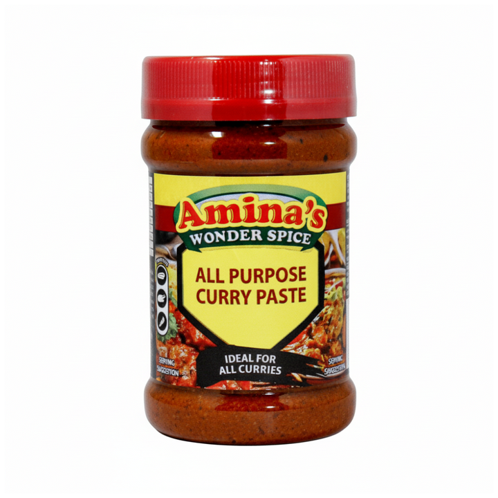 Jar of Amina's Wonder Spice All Purpose Curry Paste on a green background