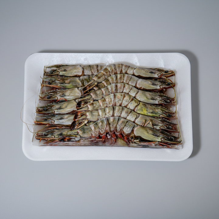 Pack of Tiger Head-On Prawns 8_12 sized, displayed on a white surface.